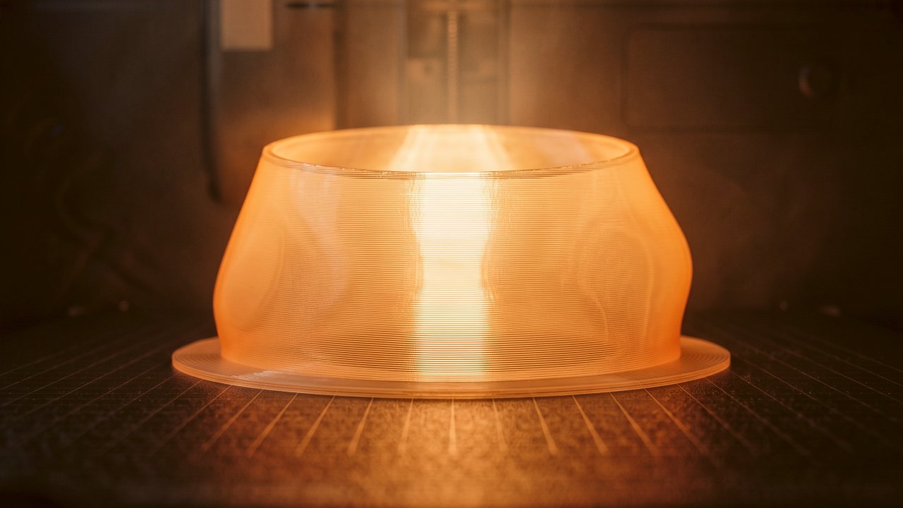 The shade switched on, glowing amber